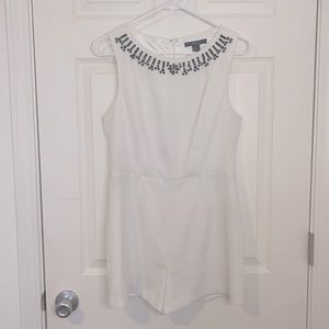 All white romper with black bejewels